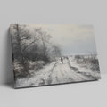 Framed canvas print of a winter landscape with a snowy path and figures walking, in a monochrome colour scheme