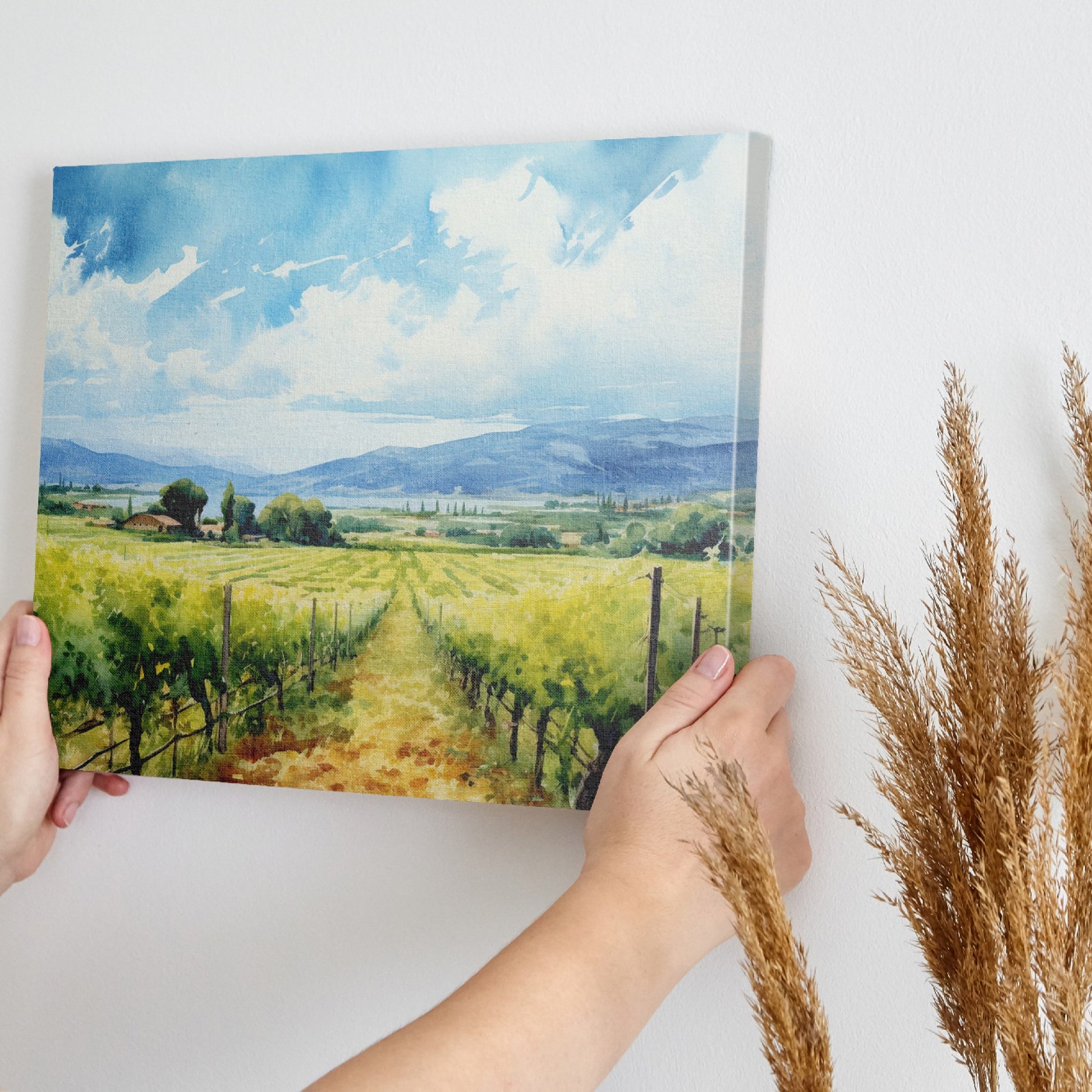 Framed canvas print of a scenic watercolor vineyard landscape with lush greenery and open sky