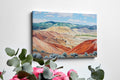 Framed canvas print of a serene and rustic painted hills landscape