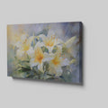 Framed canvas print of impressionist style lilies in vibrant cream and yellow hues