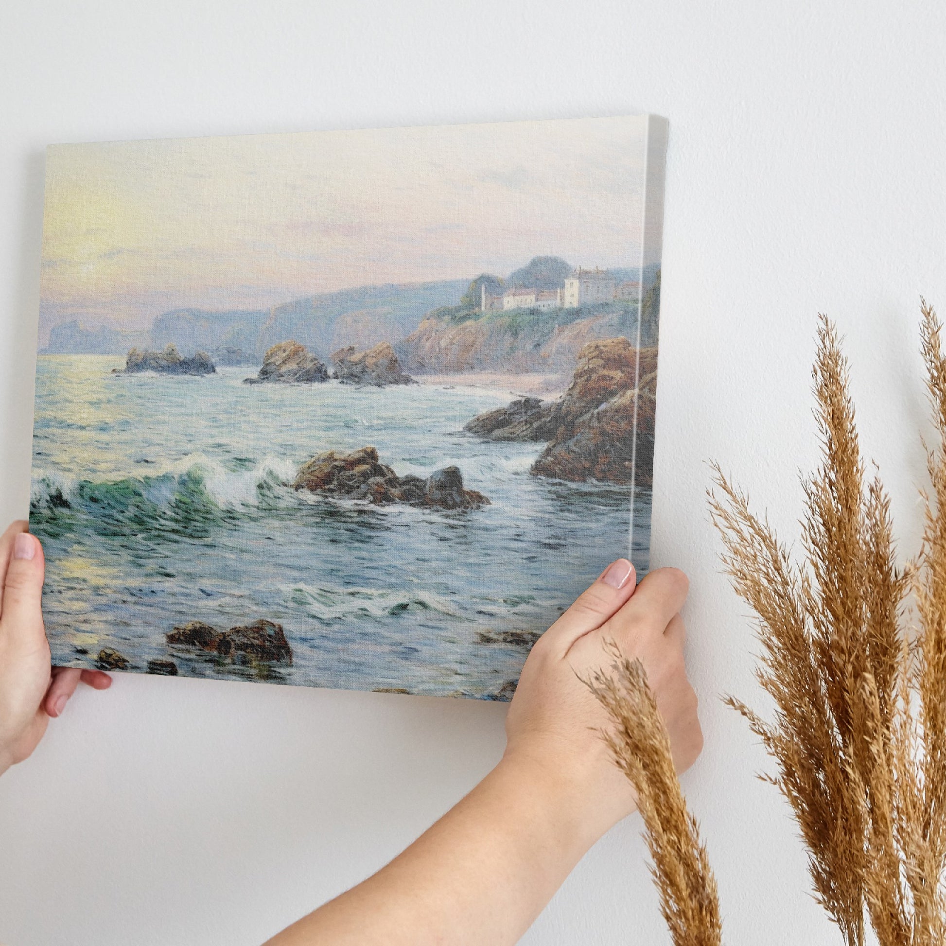 Framed canvas print of a coastal sunset impressionist painting with soft pastel colours and textured ocean waves