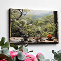 Framed canvas print of a serene Japanese tea garden view with cherry blossoms and mountains