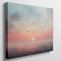 Framed canvas print of a tranquil seascape at sunset with birds and pastel skies