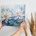 Framed canvas print of ethereal watercolor lotus flowers in tranquil blue hues