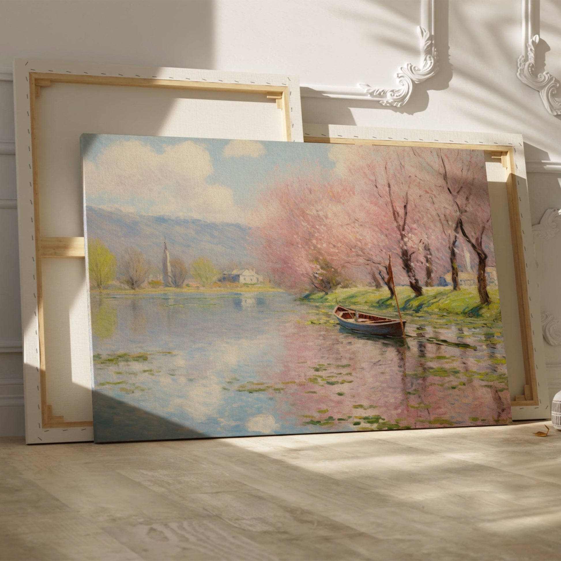 Framed canvas print of a tranquil river landscape featuring blooming cherry blossoms and a boat, in Impressionist style