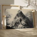 Framed canvas print of a lone mountaineer making their way up a foggy, monochromatic mountain scene