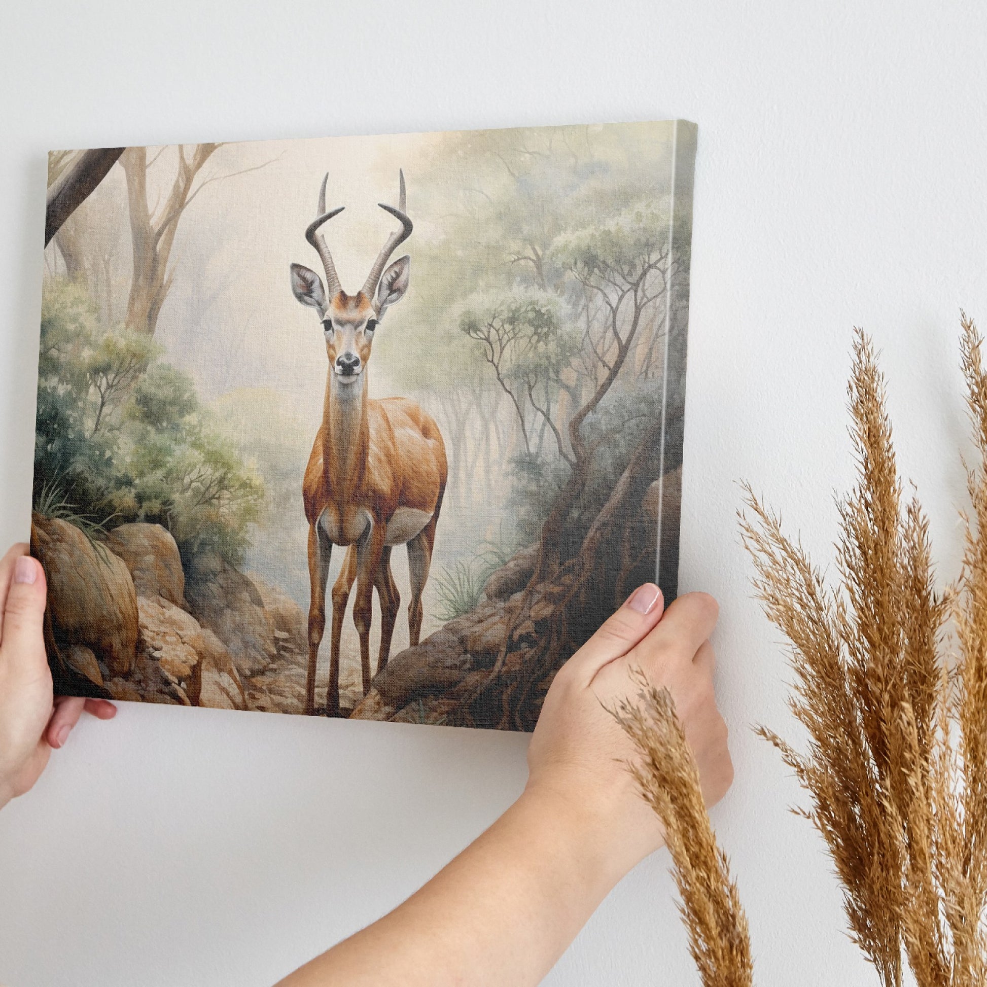 Framed canvas print of a realistic antelope in a misty forest setting with warm, earthy tones