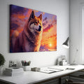 Framed canvas print of a majestic wolf against a vibrant sunset background in fiery tones