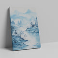 Framed canvas print of a tranquil blue watercolour landscape with misty mountains, silhouetted trees, and flying birds