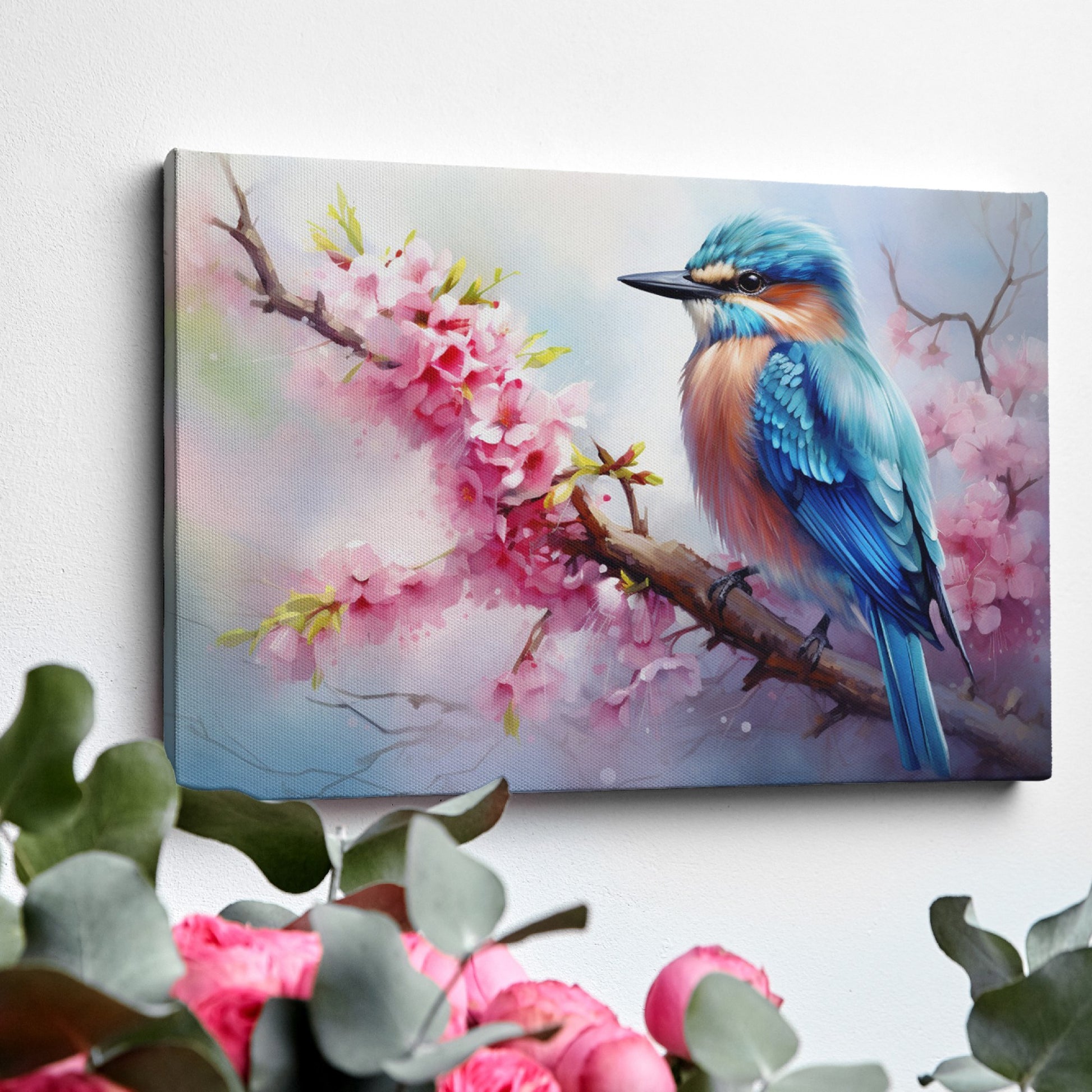 Framed canvas print of a vibrant kingfisher on a flowering cherry blossom branch