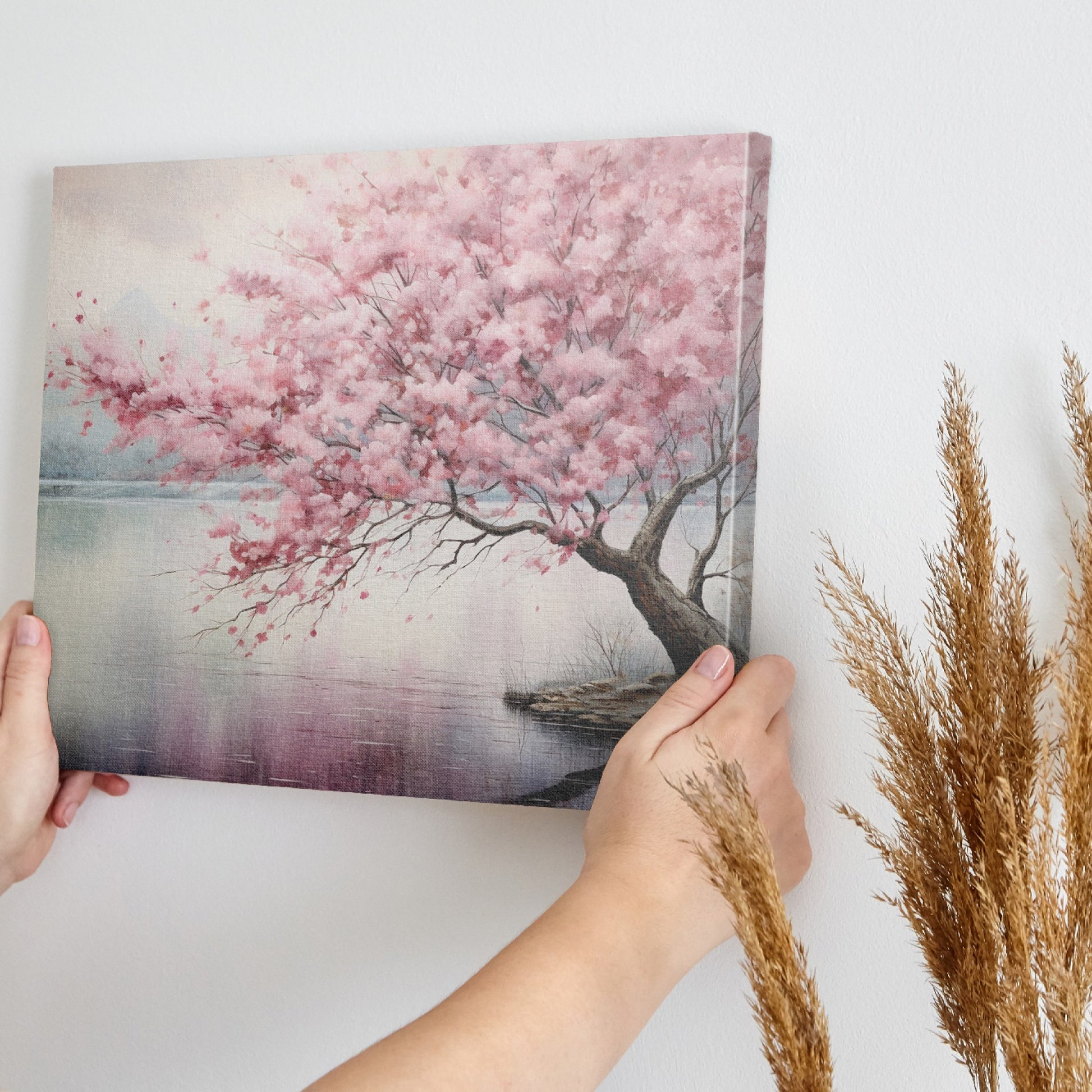 Framed canvas print of a serene cherry blossom tree by a tranquil lake with soft pastels and misty ambience