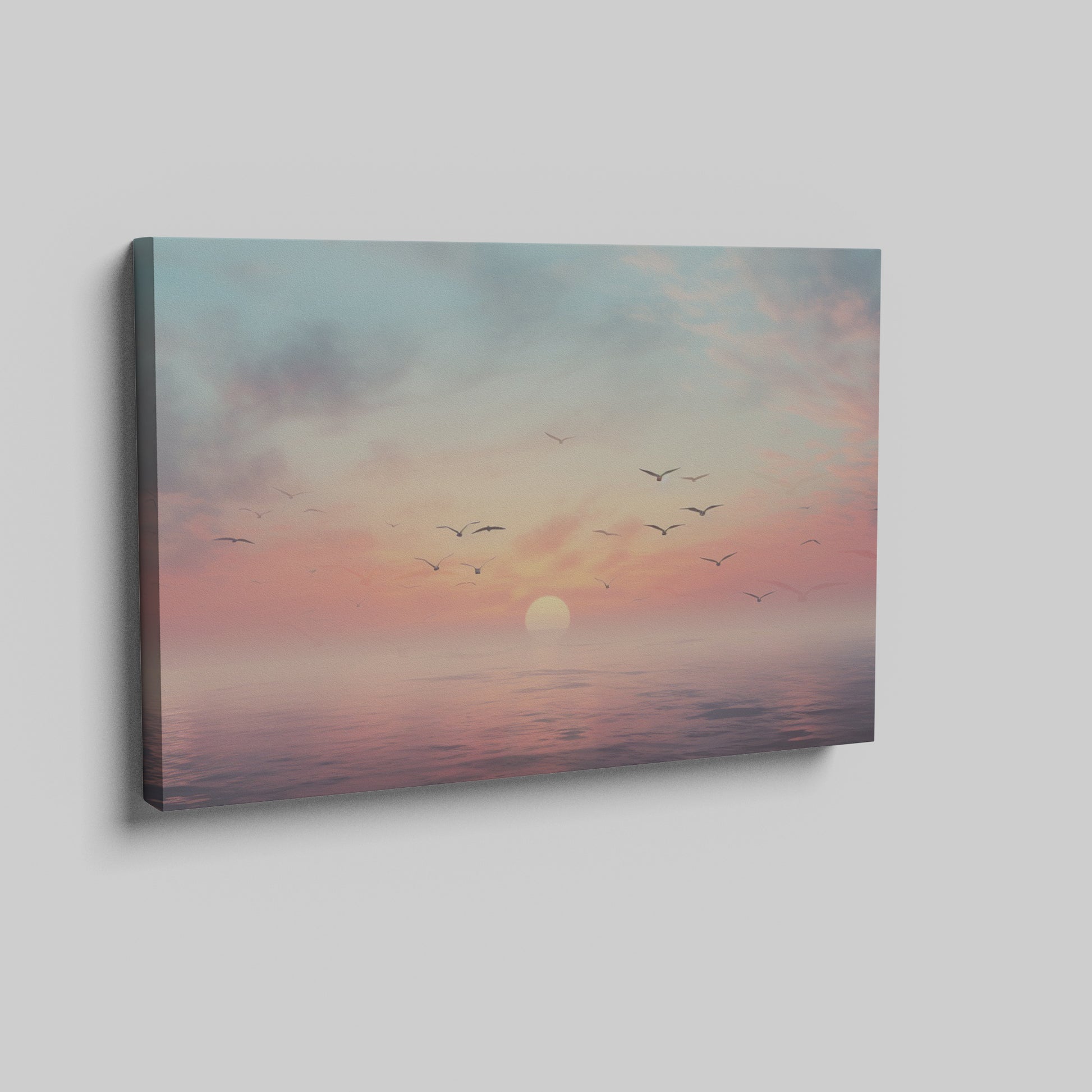 Framed canvas print of a tranquil seascape at sunset with birds and pastel skies