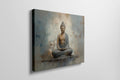 Framed canvas print of a serene Buddha in meditative pose with abstract earthy background