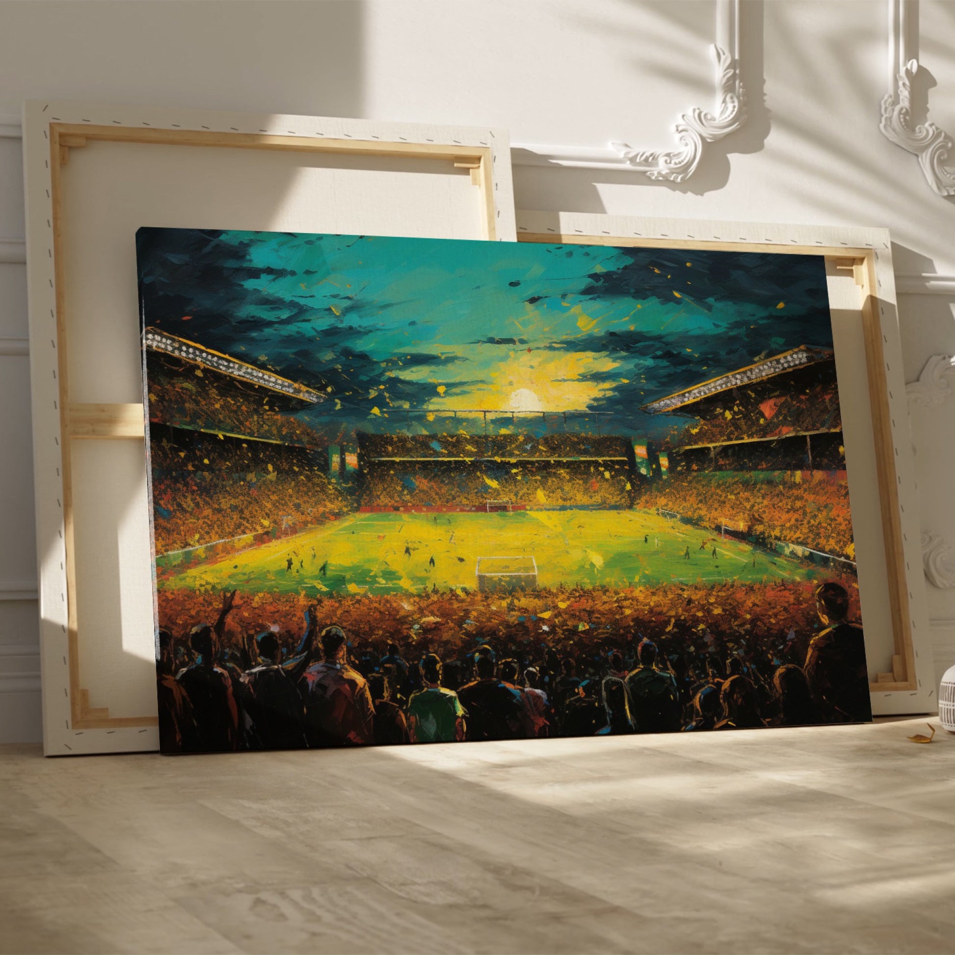 Framed canvas print of an impressionist painting capturing a football match at sunset with a cheering crowd