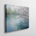 Framed canvas print of Cherry Blossoms by a Tranquil Lake with Pastel Colours