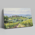 Framed canvas print of a Tuscan countryside panorama with a vineyard and rolling hills in watercolor style