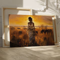 Framed canvas print of a figure in traditional attire at sunset with a savannah wildlife scene