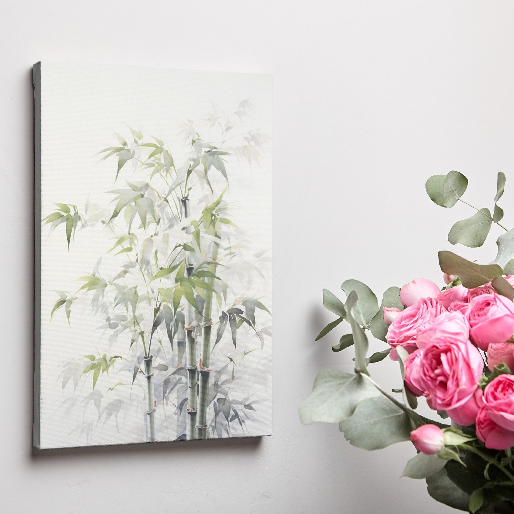 Framed canvas print of serene bamboo and leaves in a natural, soothing green and white palette