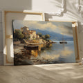 Framed canvas print of a Mediterranean coastal village with boats and serene sea reflections