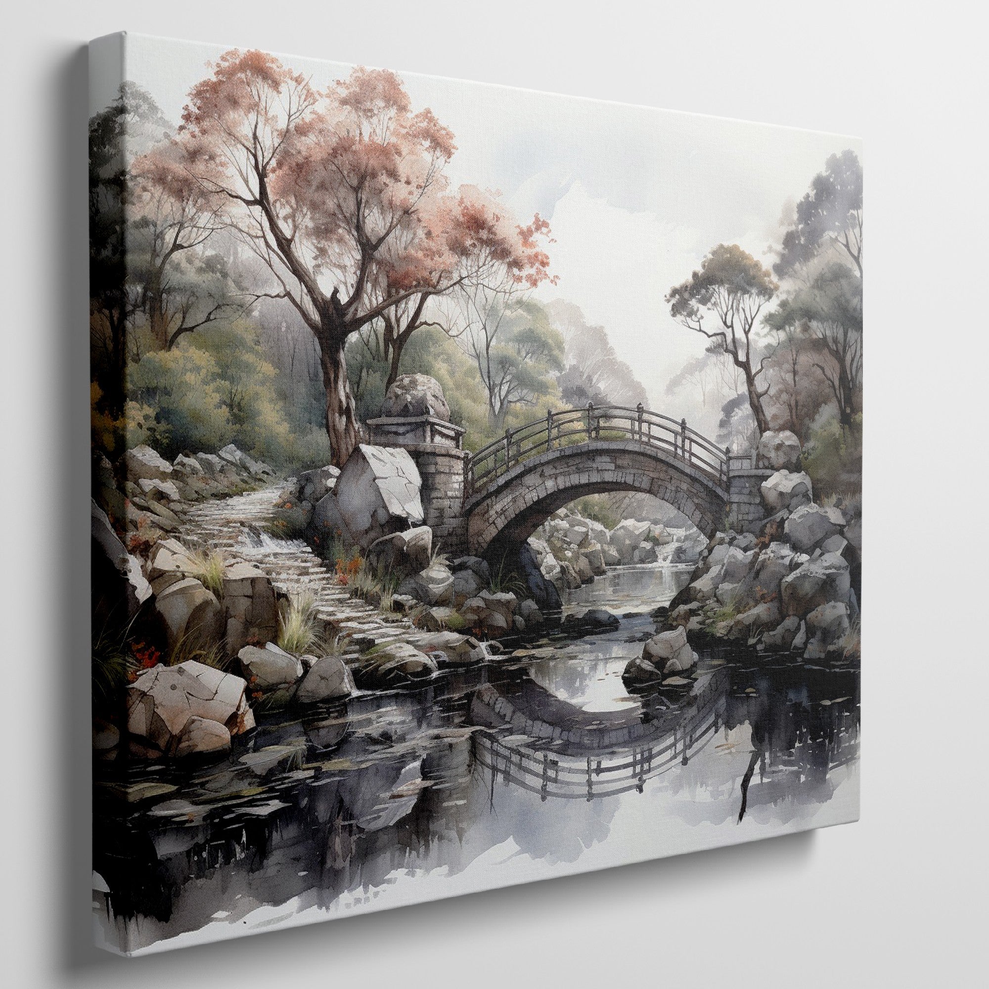 Framed canvas print of an autumnal stone bridge over a serene stream, surrounded by trees with watercolour details