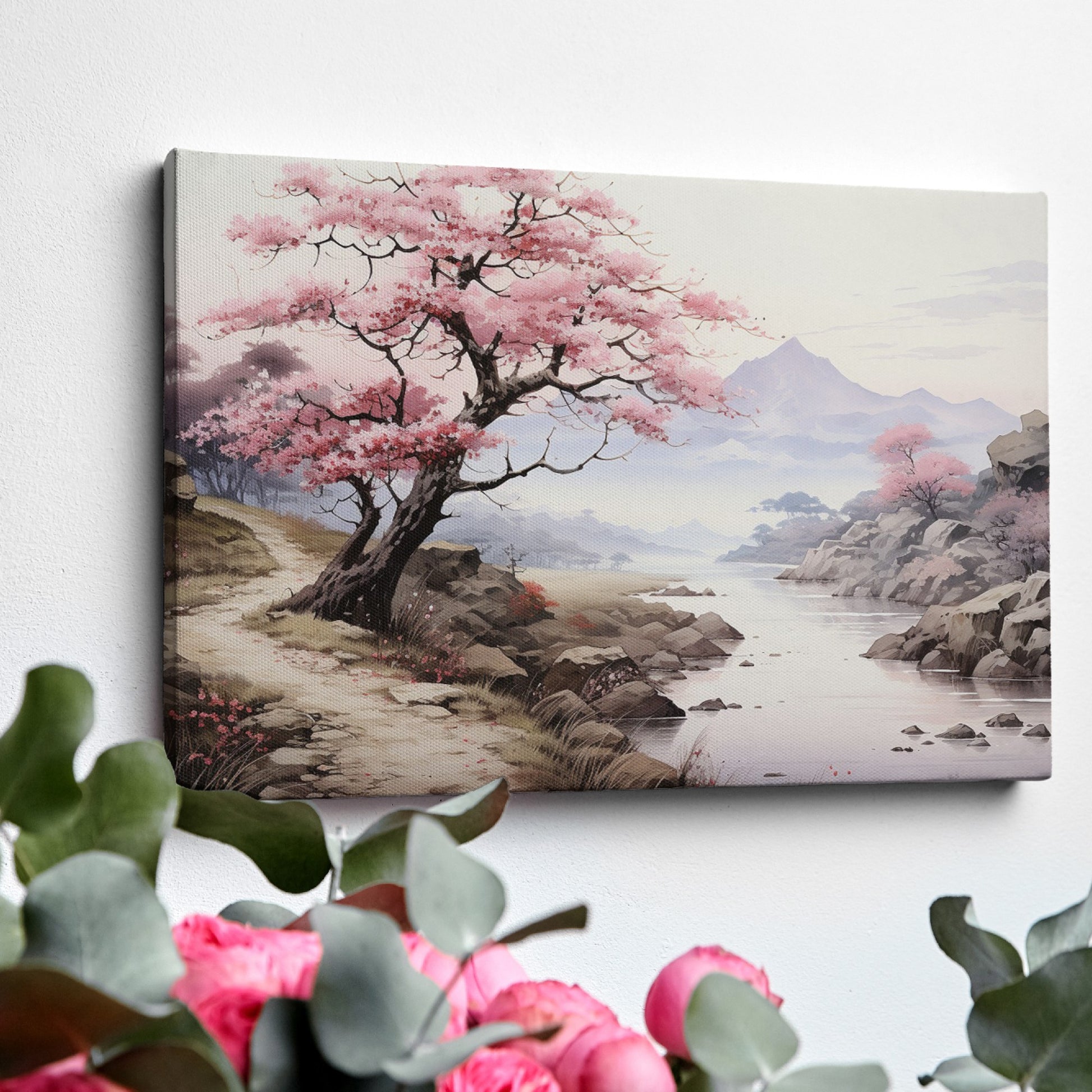 Framed canvas print of a serene cherry blossom landscape with mountains and a river