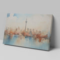 Framed canvas print of a soothing abstract cityscape with watercolour skyline and reflections