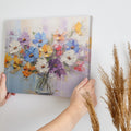 Framed canvas print of vibrant impasto painted flowers in a vase with rich textures and a colourful palette