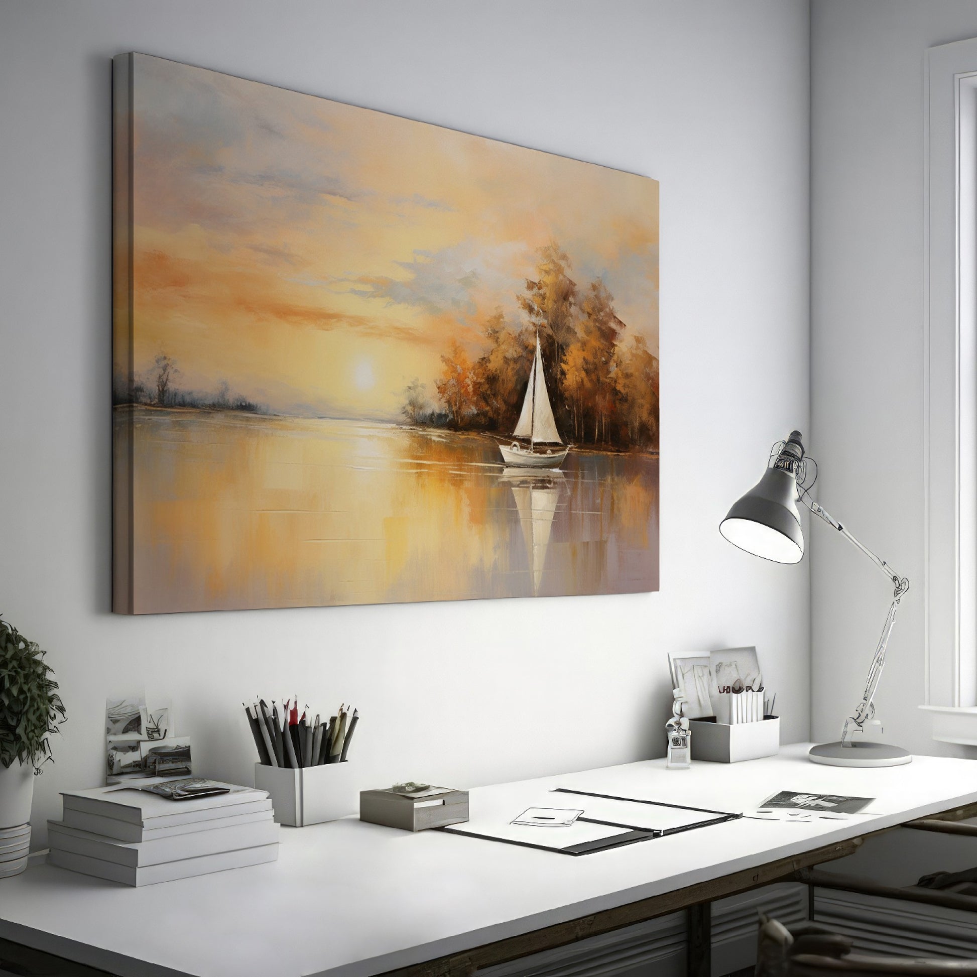 Framed canvas print of a sailboat during sunset with golden sky and water reflections