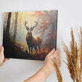 Framed canvas print of a majestic stag in an autumn forest with golden light filtering through the trees