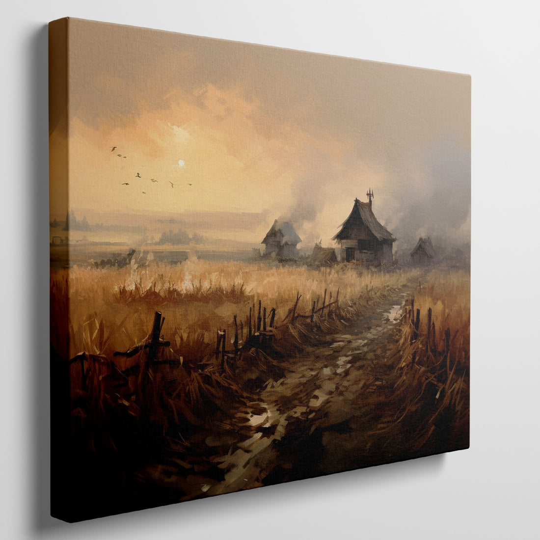 Framed canvas print of a rustic countryside at sunset with golden fields and cottages