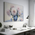 Framed canvas print of realistic dahlia flowers in a vintage blue vase with soft pastel tones