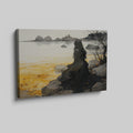 Framed canvas print of a woman in a gothic gown overlooking a golden sunset seascape with a castle