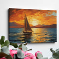 Framed canvas print of a sailboat against a vivid sunset with warm orange and blue tones