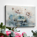 Framed canvas print of watercolour lotus flowers with pastel pink and blue tones