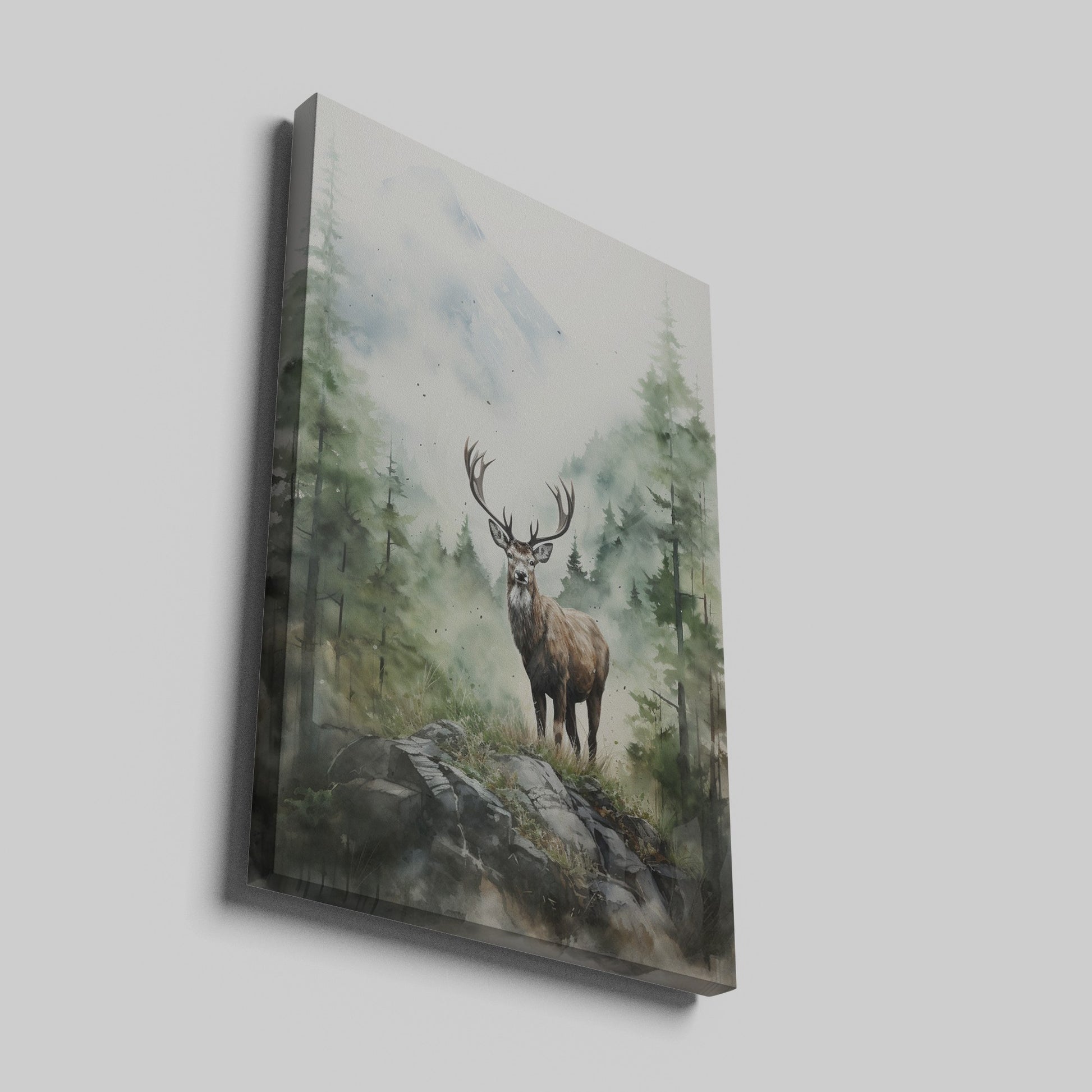 Framed canvas print of a majestic stag set against watercolour misty mountains and a lush forest