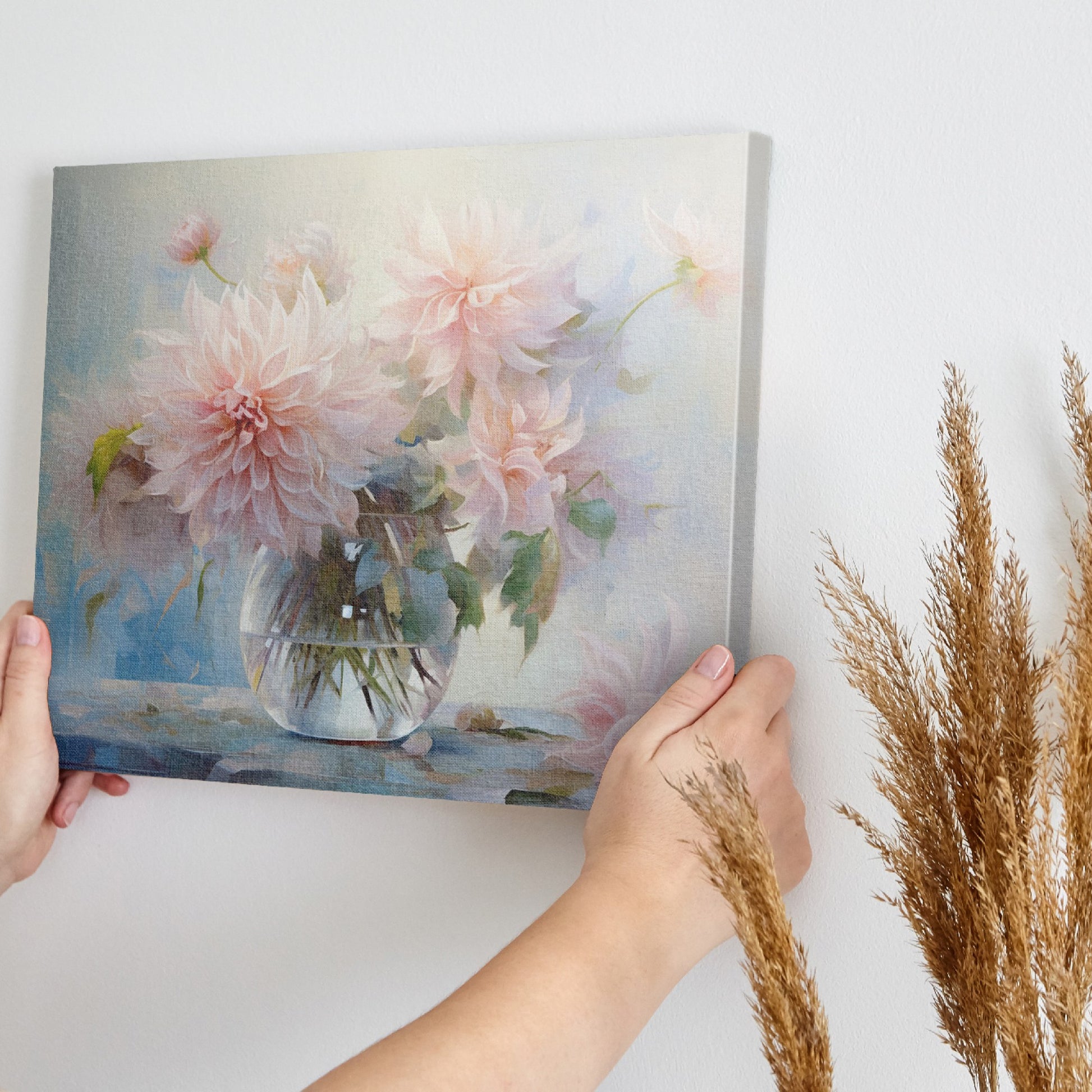 Framed canvas print of delicate dahlias in a glass vase with a soft pastel palette