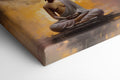 Framed canvas print of serene Buddha in meditation with abstract warm background