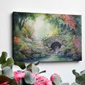 Framed canvas print of a tranquil watercolour garden with a stone bridge and flowing stream surrounded by colourful foliage