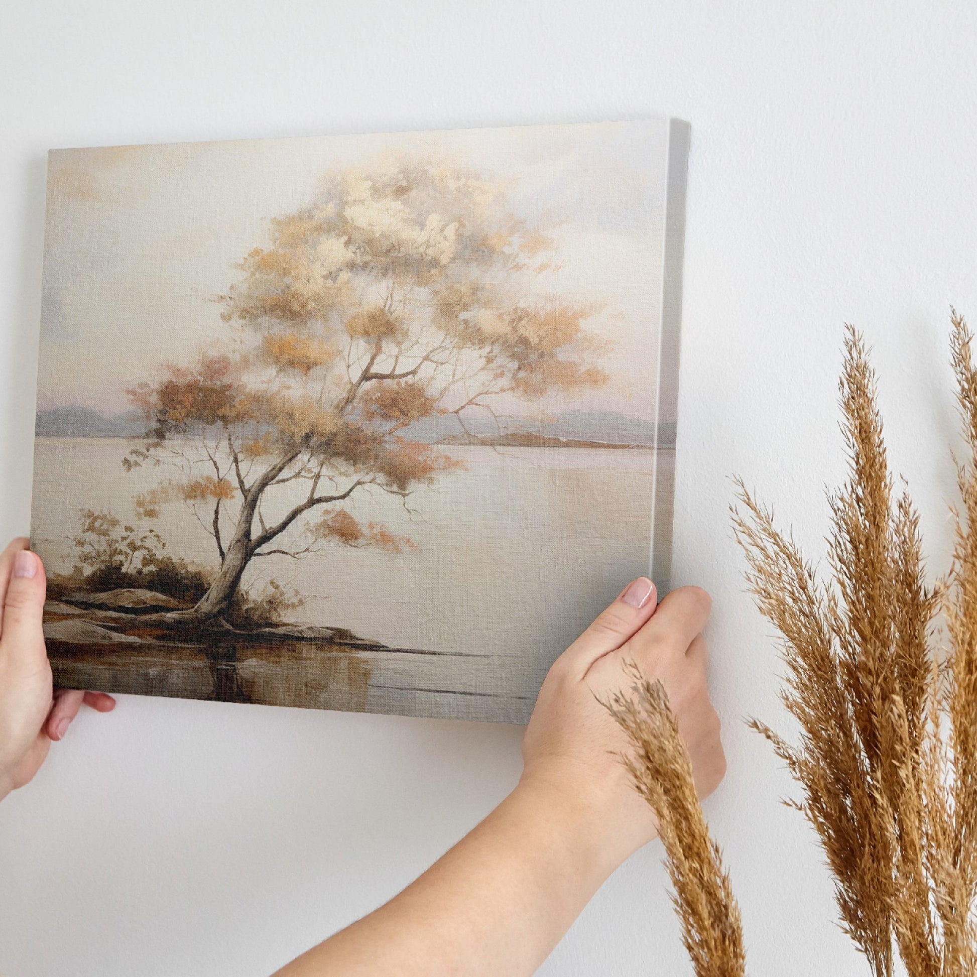 Framed canvas print of a tranquil lake landscape with an autumn tree at dusk