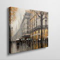 Framed canvas print of a Parisian streetscape with autumn leaves and rain