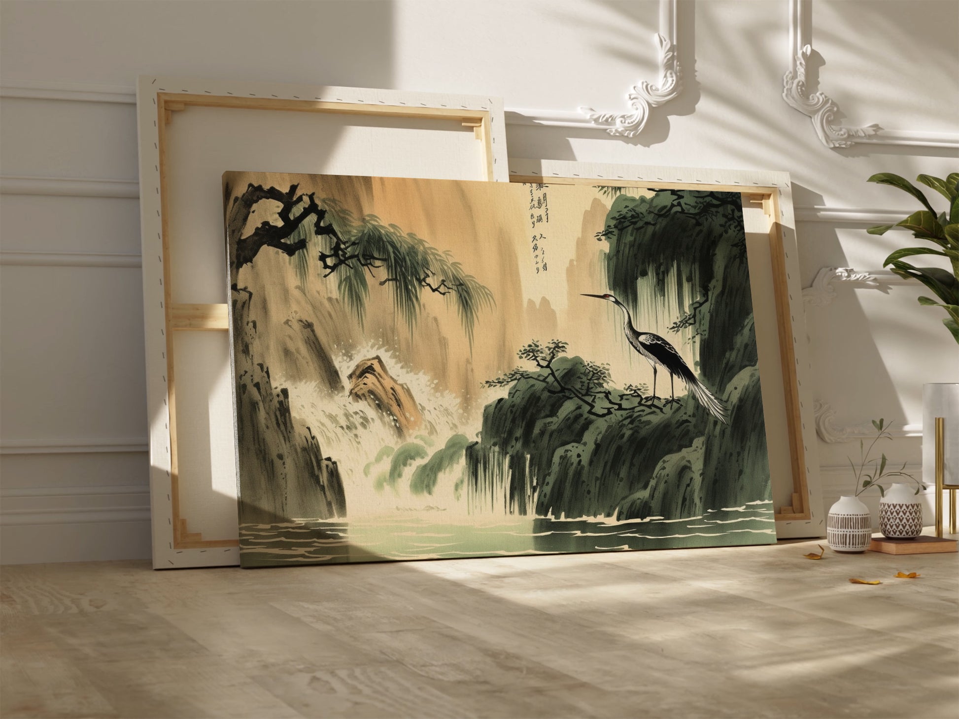 Framed canvas print of an Oriental crane beside a waterfall in traditional Chinese ink wash style