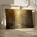 Framed canvas print of a mystical autumn forest with a lone wanderer on a sunlit path