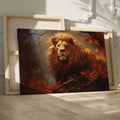 Framed canvas print of a majestic lion in an autumn forest with vibrant red and orange leaves