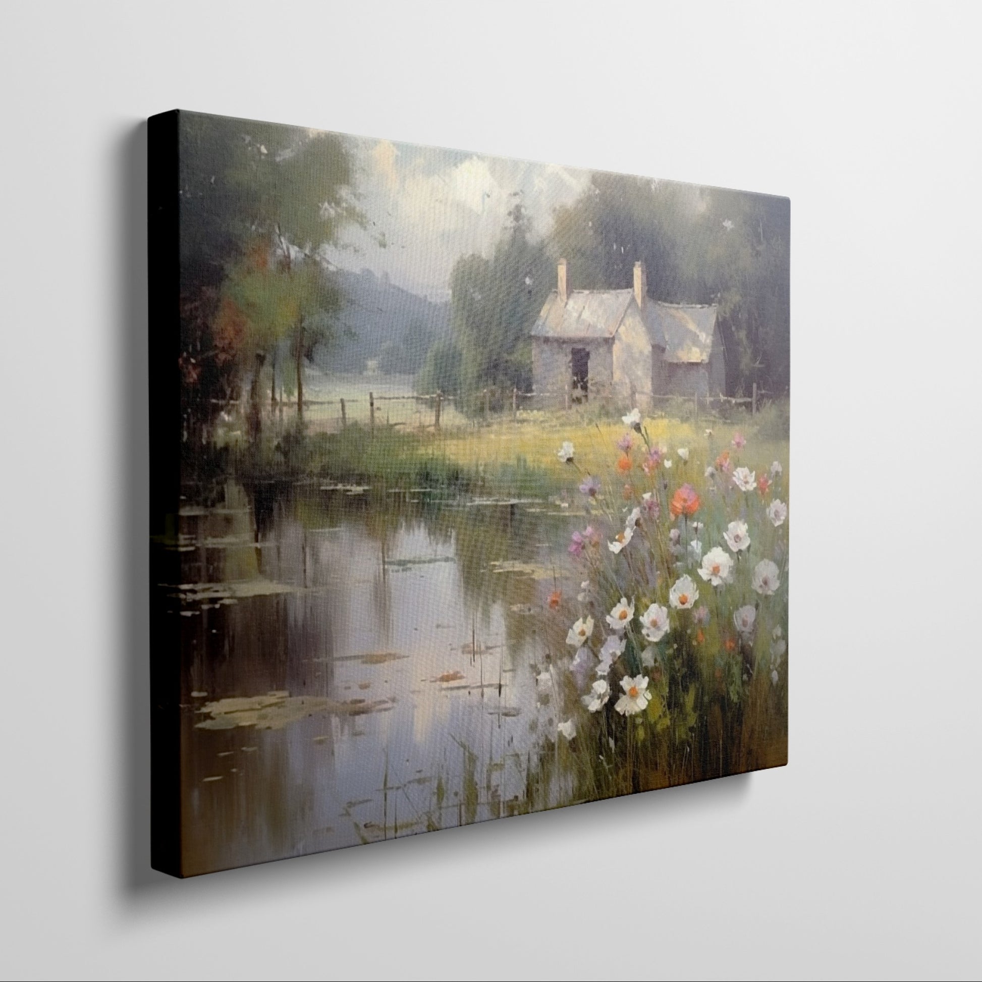 Framed canvas print of a rustic cottage by a peaceful lake with wildflowers in the foreground