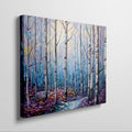 Framed canvas print of a stylised geometric birch forest in vibrant blue, purple, and yellow tones