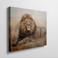 Framed canvas print of a realistic lion resting in the golden savannah