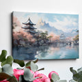 Framed canvas print of traditional Japanese pagoda and cherry blossoms with mountains in the background