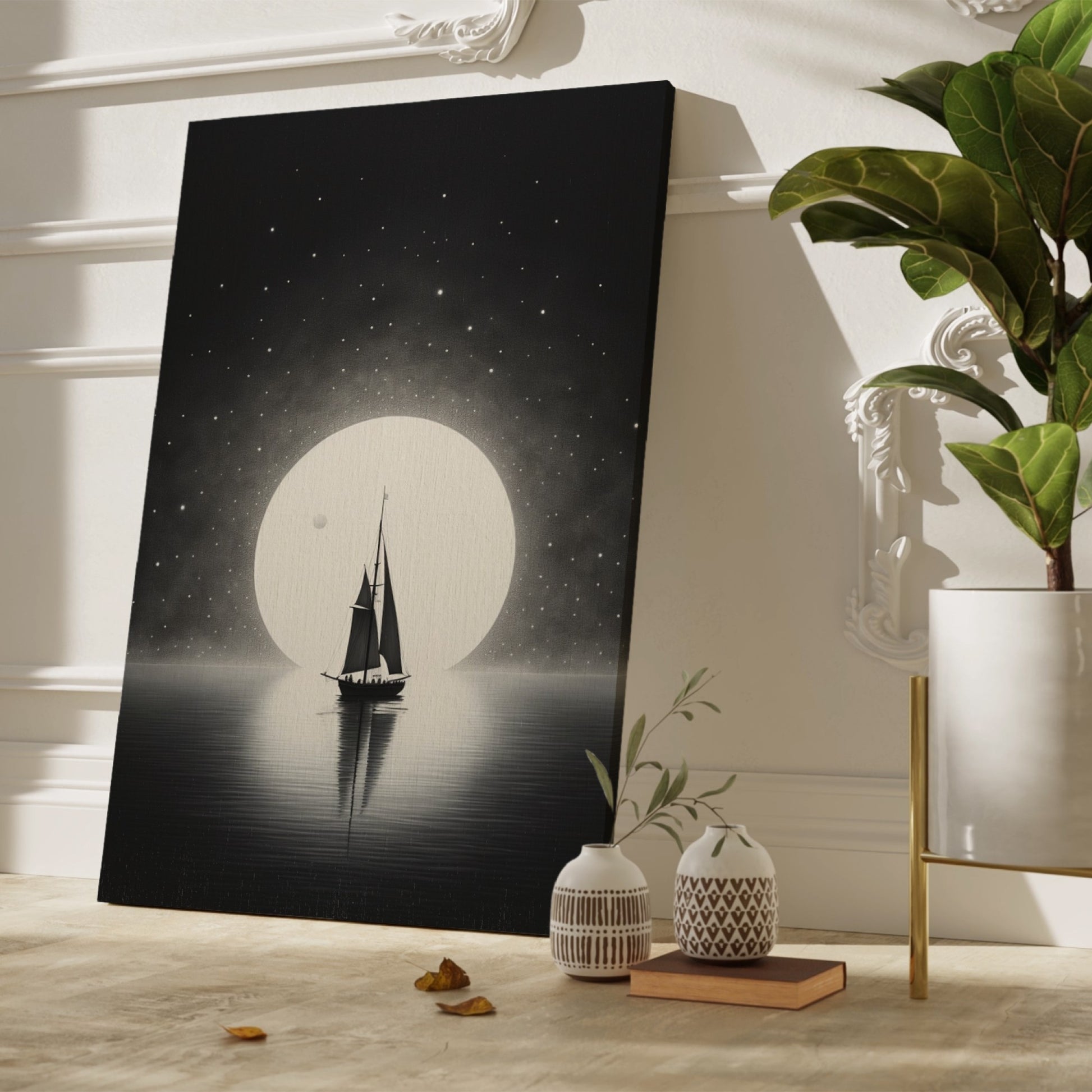 Framed canvas print of a sailboat silhouette against a large moon and starry sky in monochrome tones