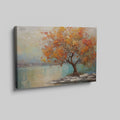 Framed canvas print of a textured autumnal tree with orange and gold foliage by a serene lake