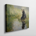 Framed canvas print of a bear sitting by a pond with floral surroundings